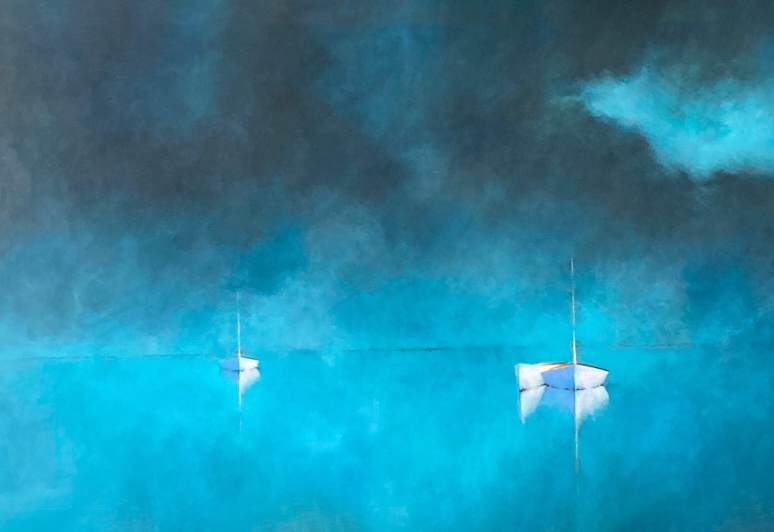 Three small white sailboats float on calm, bright blue water under a cloudy sky. The water reflects the boats and light, creating a serene, misty atmosphere with soft, blended shades of blue and gray dominating the scene.